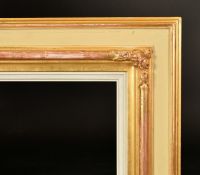 Early 20th Century a green painted and gilt composition frame, rebate size 30
