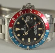A ROLEX GMT-MASTER OYSTER PERPETUAL SUPELATIVE CHRONOMETER, 580, 