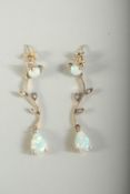 A GOOD PAIR OF 9CT GOLD, OPAL AND DIAMOND DROP EARRINGS, boxed.