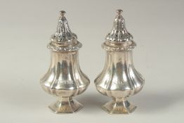 A PAIR OF SALT AND PEPPERS. 4.5ins high.