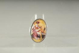 A SILVER PILL BOX, the lid with a nude. 3.5cms x 2.5cms.