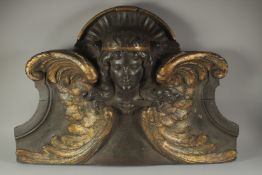 A VERY GOOD CARVED OAK AND GILDED WING ANGEL. Possibly 17th Century. 2ft 10ins long, 1ft 10 ins
