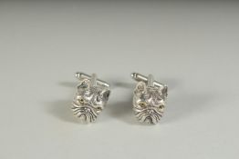 A PAIR OF SILVER FRENCH BULLDOG CUFFLINKS with emerald collar, boxed.