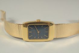 A GENTLEMAN'S 18CT GOLD WRISTWATCH by GIRARD-PERREGAUX with dark blue. Stamped 18k. No. 9113 FA.