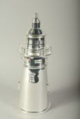 A SILVER PLATE LIGHTHOUSE COCKTAIL SHAKER.