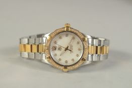 A GOOD TAG HEUER AQUARACER 300 METER WRIST WATCH, No. RWF 5190, set with 45 diamonds, approx. 0.