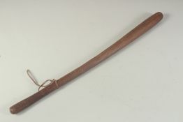 A 19TH CENTURY POLYNESIAN RIBBED WAR CLUB. 24ins long.