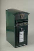 A REPLICA IRISH CAST IRON POST BOX.