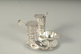 A SILVER PLATE JOCKEY CRUET.