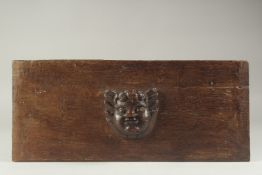 AN 18TH CENTURY CARVED WOOD CHERUB HEAD on a marble plaque. 20ins long.
