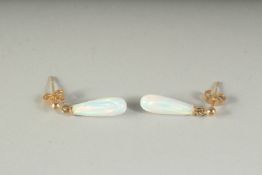 A PAIR OF 9CT GOLD TEAR DROP OPAL EARRINGS, boxed.