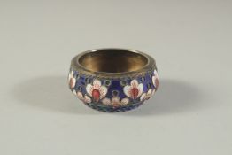 A SMALL RUSSIAN SILVER AND ENAMEL CIRCULAR SALT.