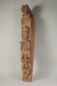AN 18TH CENTURY CARVED WOOD COLUMN carved with a man and a lion. 26ins long, 4ins wide.