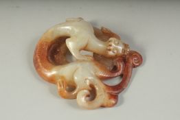 A CHINESE ARCHAIC STYLE JADE. 8cms x 6.5cms.