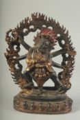 A TIBETAN GILT BRONZE DEITY. 27.5cms high.