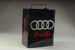 AN AUDI BLACK OIL CAN.