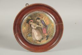 A FRAMED POT LID 