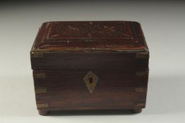 AN 18TH CENTURY COLONIAL PERFUME BOX with six glass bottles. 5.5ins high.