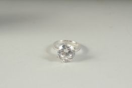 A SILVER AND CZ SOLITAIRE RING.