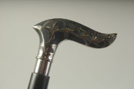 A WALKING STICK WITH CHROME HANDLE 