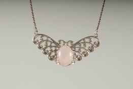 A SILVER ROSE QUARTZ BUTTERFLY NECKLACE, boxed.