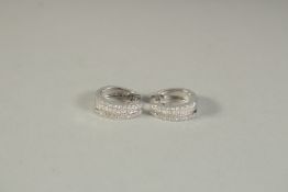 A PAIR OF 18CT WHITE GOLD BAGUETTE CUT HOOP EARRINGS.
