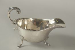 A SILVER SAUCE BOAT. London 1930.