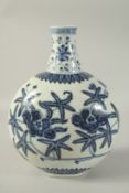 A CHINESE BLUE AND WHITE PORCELAIN MOON FLASK with floral decoration. 31cm high.