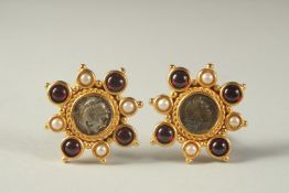 A PAIR OF EARRINGS by LINDA LEVINSON.