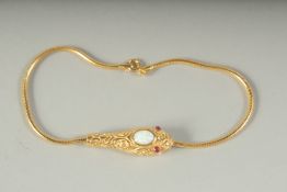A SILVER GOLD PLATED OPAL SET SNAKE BRACELET, boxed.