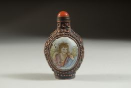 A CHINESE CLOISONNE SNUFF BOTTLE with panels of European ladies.