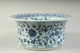A CHINESE BLUE AND WHITE PORCELAIN WASH POT decorated with lotus, the interior with lucky symbols.