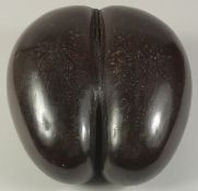A LARGE AND RARE ANTIQUE COCO DE MER, 28cm x 28cm x 18cm (approx.).