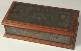 A FINE SILVER NIELLO MOUNTED WOODEN BOX, with hinged lid, 27cm x 13.5cm.