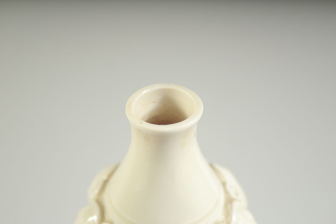A CHINESE DING STYLE WHITE GLAZED DOUBLE GOURD VASE, with moulded decoration, 29cm high. - Image 10 of 11
