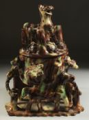 AN OTTOMAN TURKISH CANAKKALE GLAZED POTTERY SWEET BOX / TABLE PIECE, with moulded animals and flower