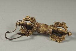 A TIBETAN GILDED DORJE, 14cm long.