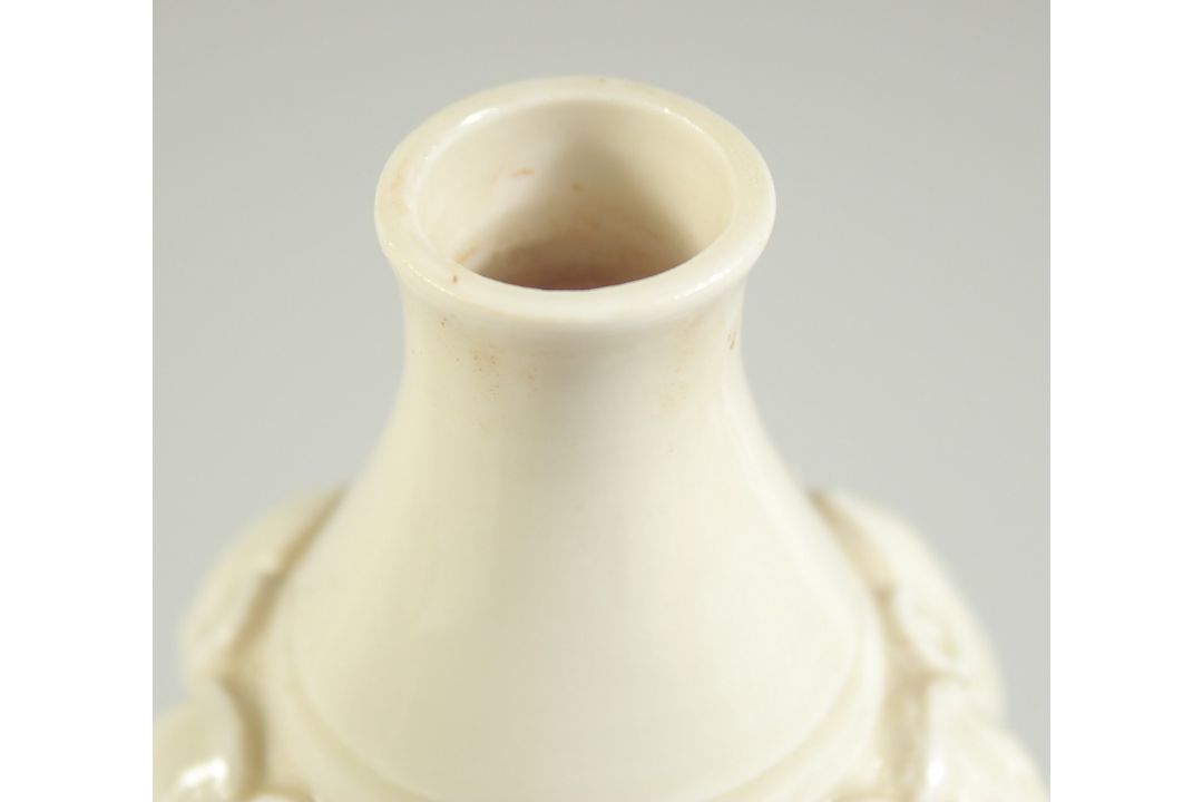 A CHINESE DING STYLE WHITE GLAZED DOUBLE GOURD VASE, with moulded decoration, 29cm high. - Image 5 of 11