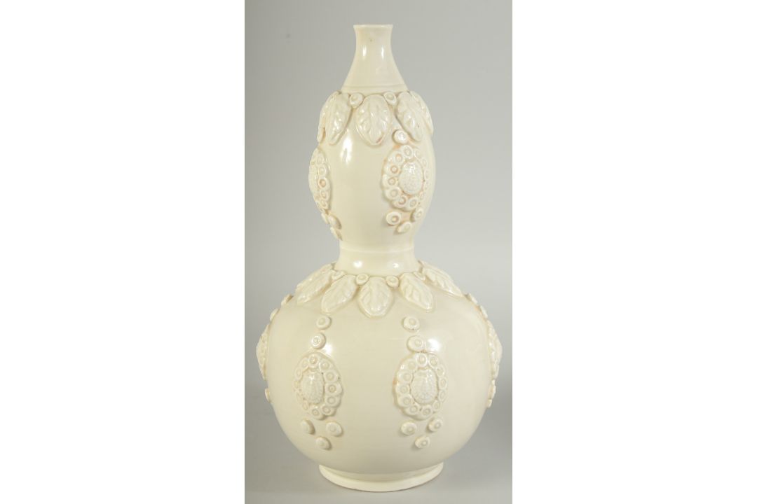 A CHINESE DING STYLE WHITE GLAZED DOUBLE GOURD VASE, with moulded decoration, 29cm high. - Image 3 of 11