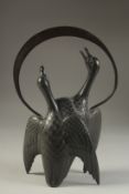 AN UNUSUAL JAPANESE MEIJI BRONZE 'GEESE' VASE, with overarching handle above the vase, formed as two
