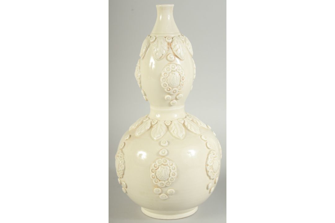 A CHINESE DING STYLE WHITE GLAZED DOUBLE GOURD VASE, with moulded decoration, 29cm high. - Image 4 of 11