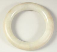 A FINE EARLY CHINESE JADE BANGLE.