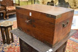 An Indian brass bound and inlaid table top writing chest.