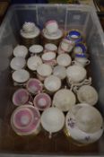 A collection of decorative porcelain cups and saucers.