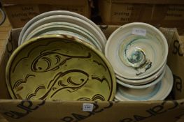 A quantity of pottery bowls.