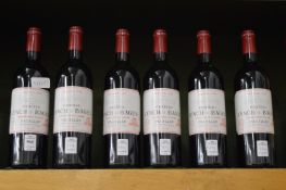 Six bottles of Chateau Lynch Bages 1998.