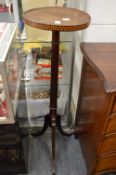 A mahogany tripod jardiniere stand.