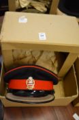Queens regiment, a dress cap and khaki cap, both with badges and original boxes.