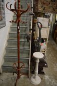 A modern bentwood coat stand and a painted jardiniere stand.