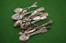 A small group of silver flatware.